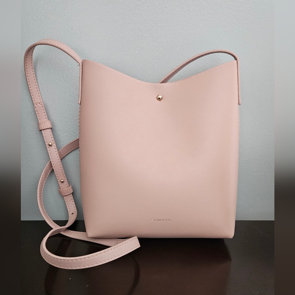 Pink Crossbody Bag with Textured Leather and Adjustable Strap